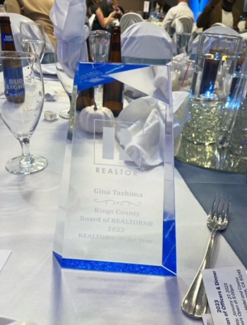 The award presented to Gina Tashima